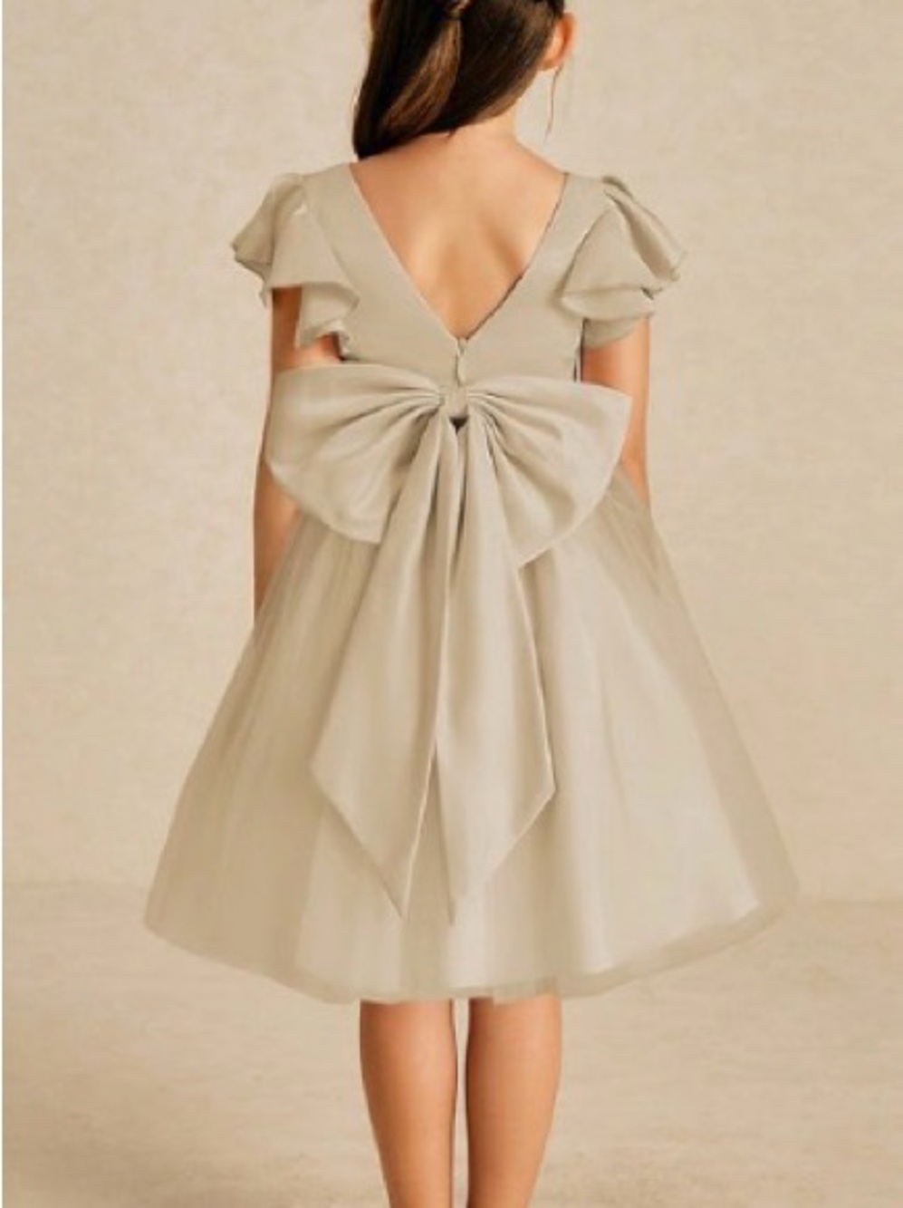 Azazie Girls “Kaeya” Bow-Back Tulle Dress in Champagne color